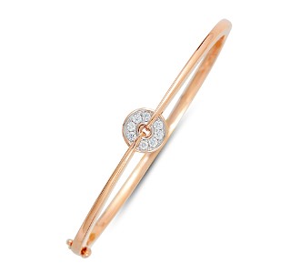 Rose gold and diamond bangle bracelet that would be great as a minimalistic piece or stacked with multiple bracelets for an artful creation