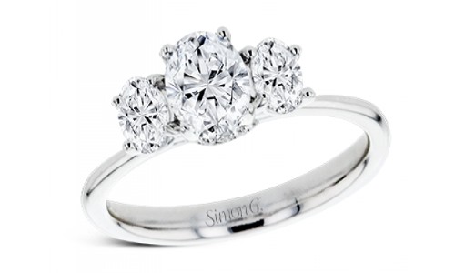 Engagement ring from Simon G. with three stone setting