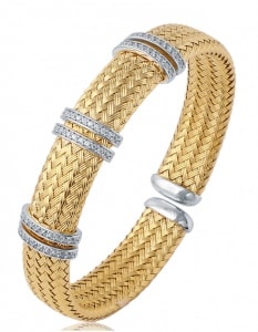a mixed metal cuff with diamond accents from Charles Garnier.