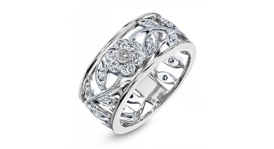 a platinum fashion ring with floral details.