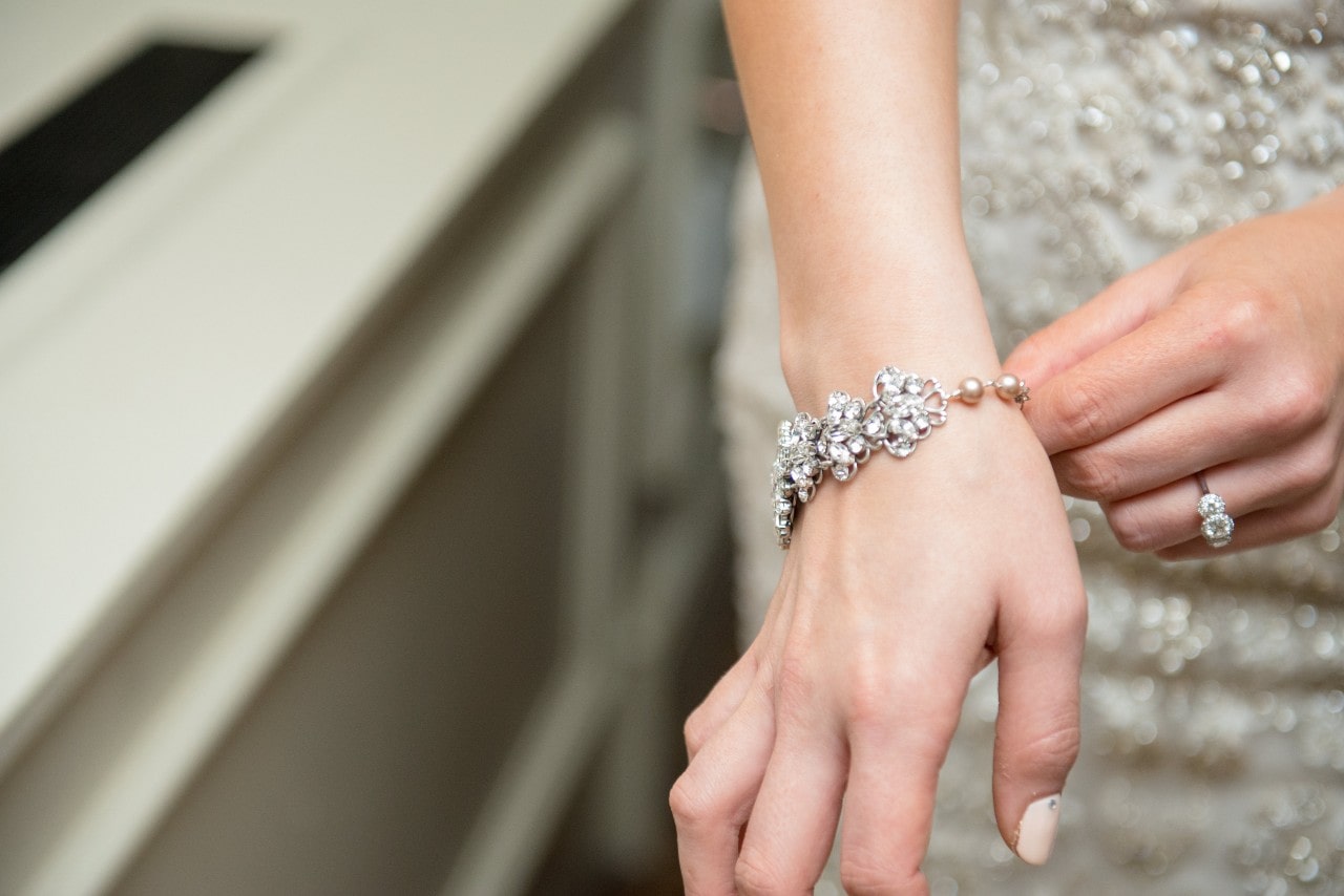 floral diamond bracelet being adjusted